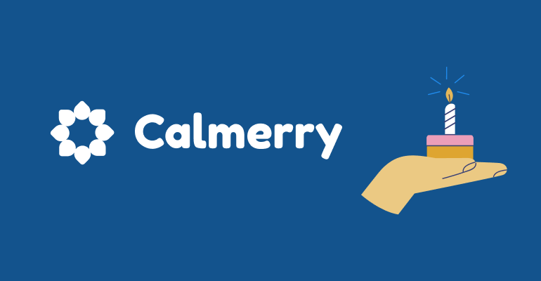 Calmerry turns 1 year – a hand is holding a cake